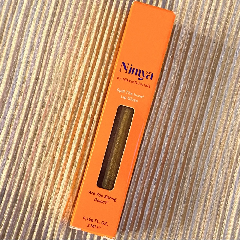 NIMYA BY NIKKI TUTORIAL SPILL THE JUICE GLOSS ARE YOU SITTING DOWN